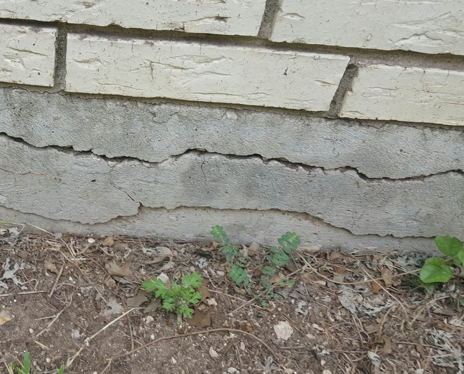 Faulty foundation with cracking.
